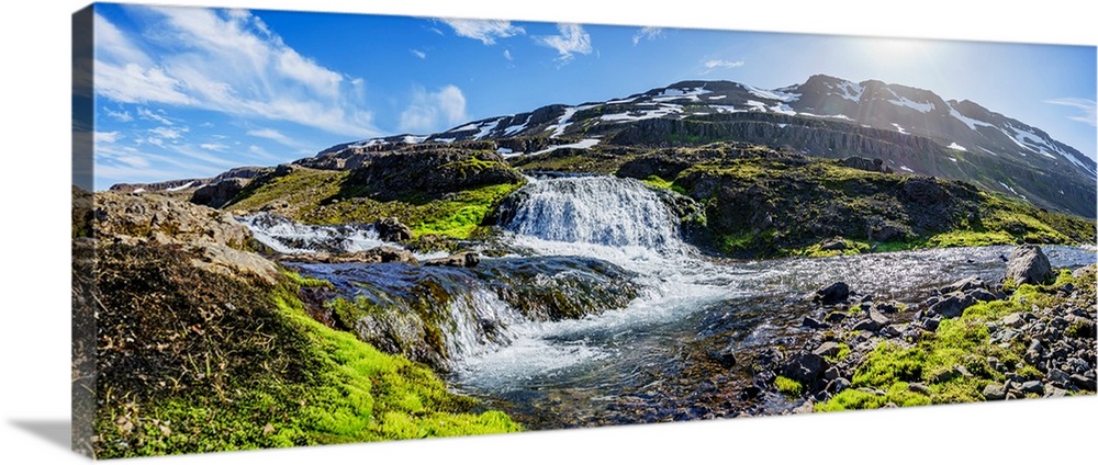 Small waterfall in Mjoifjordur, Iceland