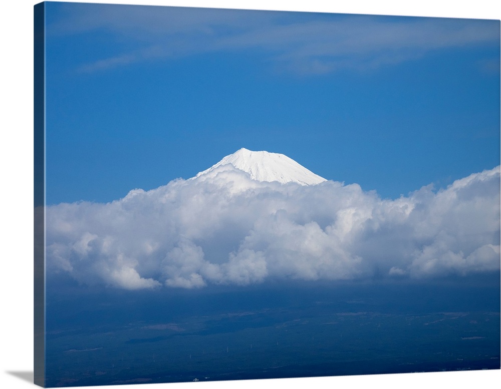 Snow covered peak of Mt Fuji seen from bullet train, Japan