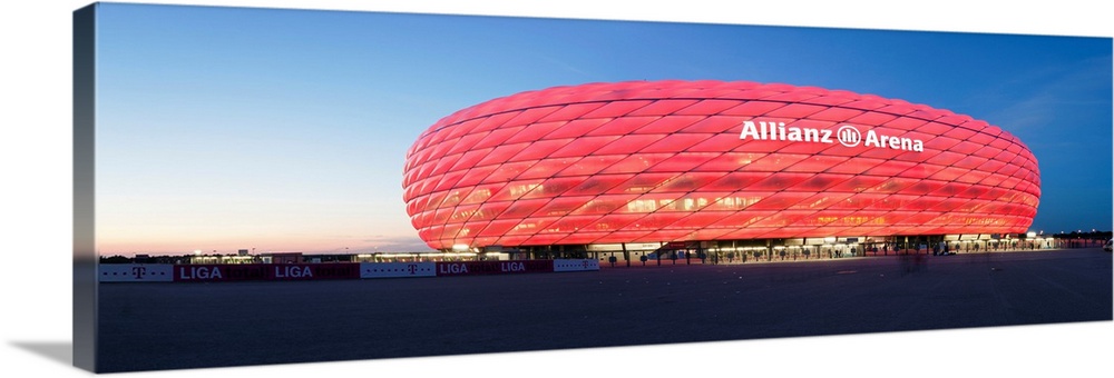 Soccer stadium lit up at dusk, Allianz Arena, Munich, Bavaria, Germany