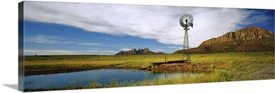 Solitary windmill near a pond, U.S. Route 89, Utah