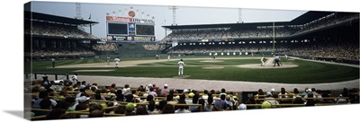 Spectators watching a baseball match in a stadium, U.S. Cellular Field, Chicago, Cook County, Illinois