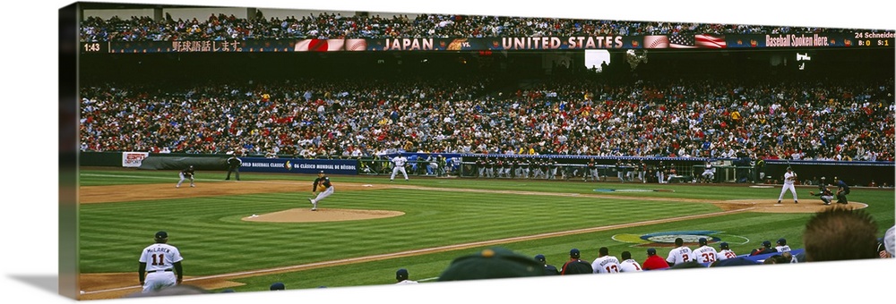 Spectators watching baseball game in a baseball stadium, Japan vs. United States, World Baseball Classic, Angel Stadium, A...