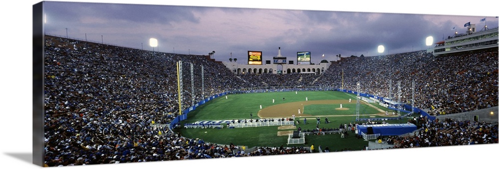 Spectators watching baseball match, Los Angeles Dodgers, Los Angeles Memorial Coliseum, Los Angeles, California,