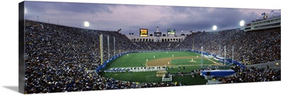 Spectators watching baseball match, Los Angeles Dodgers, Los Angeles Memorial Coliseum, Los Angeles, California,