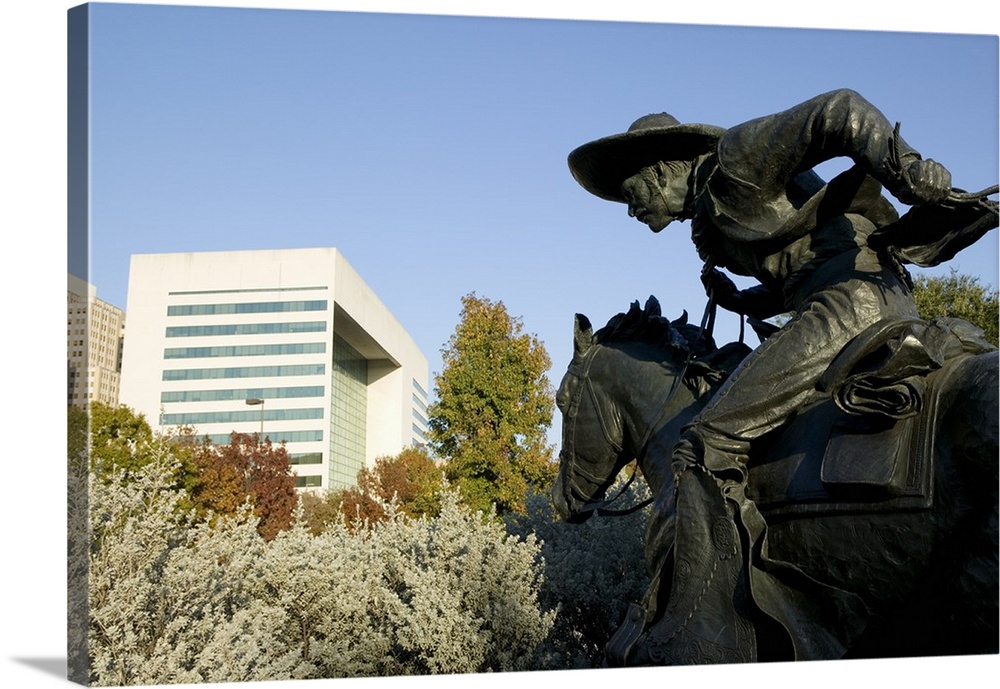 Statue of a cowboy on a horse, Cattle Drive Sculpture, Pioneer Plaza, Dallas, Texas