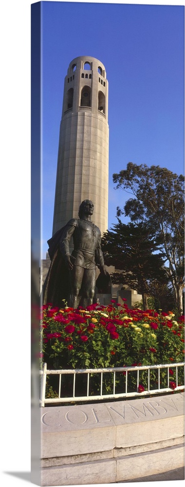 Statue of Christopher Columbus in front of a tower, Coit Tower, Telegraph Hill, San Francisco, California, USA
