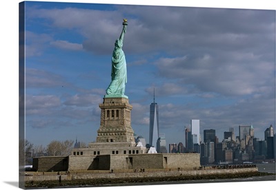 Statue Of Liberty with city in the background, Manhattan, New York City, New York State