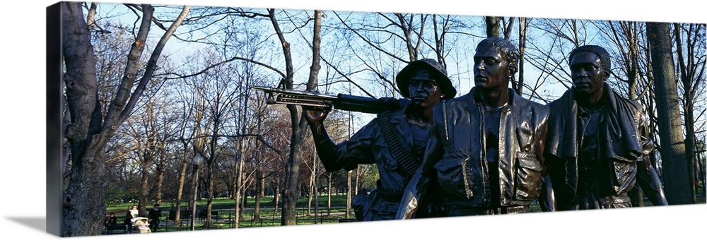 Statues of three soldiers at a war memorial The Three Soldiers Vietnam Veterans Memorial Washington DC