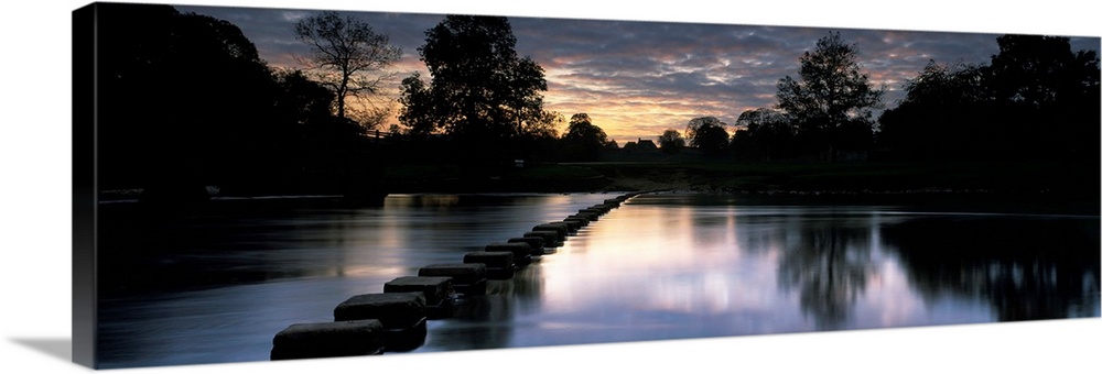 Stepping stones on the river River Wharfe Bolton Abbey Wharfedale North Yorkshire England