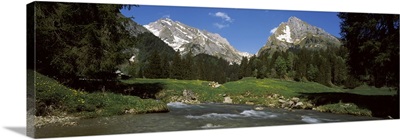 Stream flowing through a forest Mt Santis Mt Altmann Appenzell Alps St Gallen Canton Switzerland