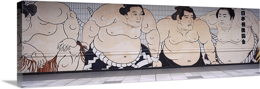 Mural on outside of Ryogoku Kokugikan, the sumo arena in Tokyo, Japan