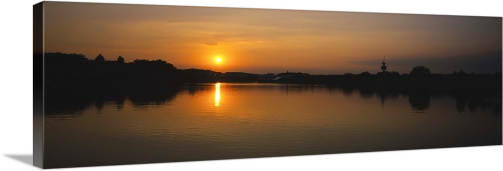 Sunset over a lake, See Park, Freiburg, Germany