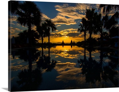 Sunset reflected in the infinity pool at Aureum Palace Hotel, Bagan, Myanmar