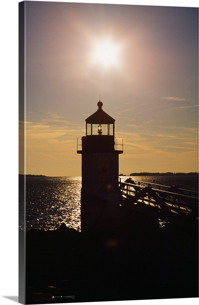 Sunstar Over Silhouetted Marshall Point Lighthouse