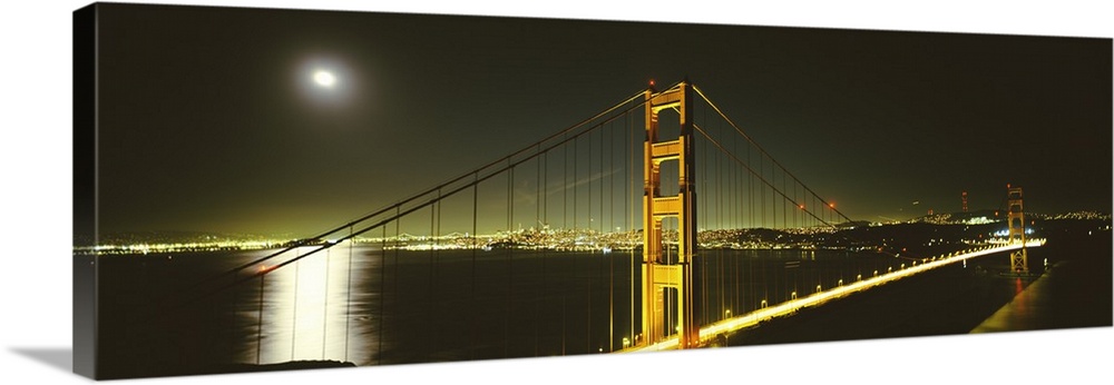 Giant panoramic photograph of the Golden Gate Bridge at night, the moonlight reflecting in the waters of the San Francisco...