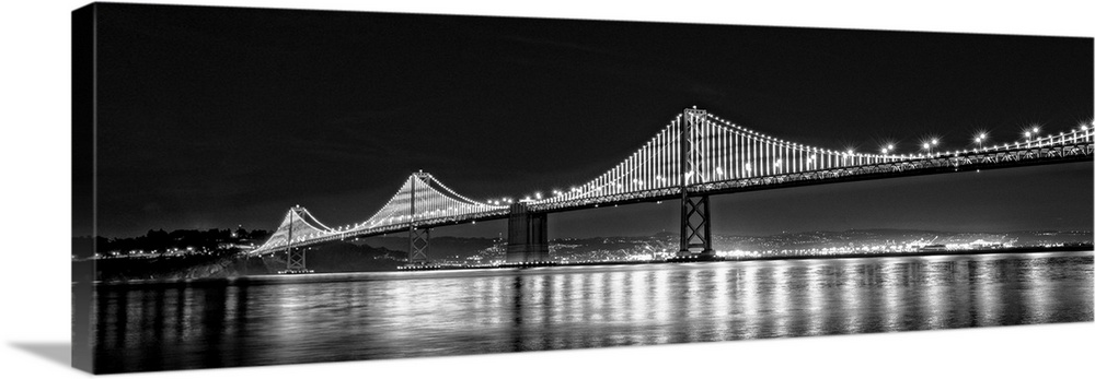 Suspension Bridge Over Pacific Ocean Lit Up At Night, San Francisco, California, USA