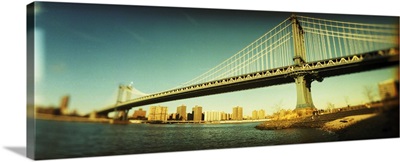 Suspension bridge with a city in the background Brooklyn Bridge Manhattan New York City New York State