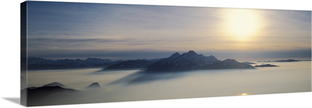 Switzerland, Luzern, Pilatus Mountain, Panoramic view of mist around a mountain peak