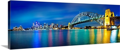 Sydney Harbour Bridge and skylines at night, Sydney, New South Wales, Australia
