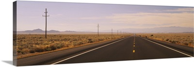 Telephone poles along a highway, Highwawy 380, New Mexico