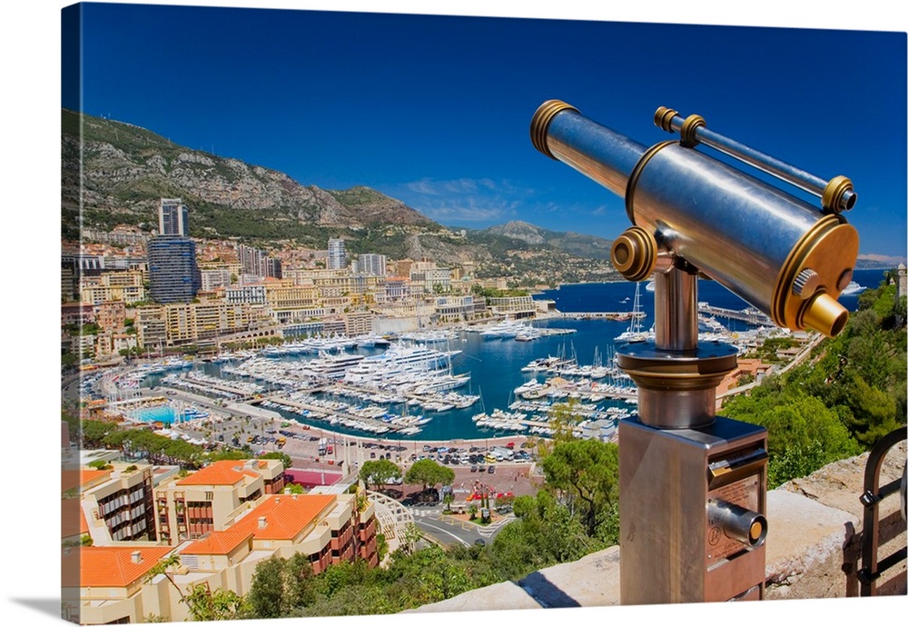 Telescope with view of Monte-Carlo and harbor in the Principality of Monaco, Western Europe on the Mediterranean Sea