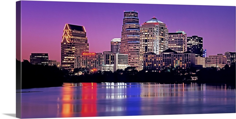 Texas, Austin, View of an urban skyline at night Wall Art, Canvas