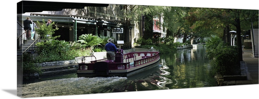 Texas, San Antonio, Rear view of a person on a boat