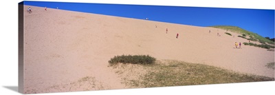 Tourists climbing a sand dune, Sleeping Bear Dunes National Lakeshore, Lake Michigan, Michigan