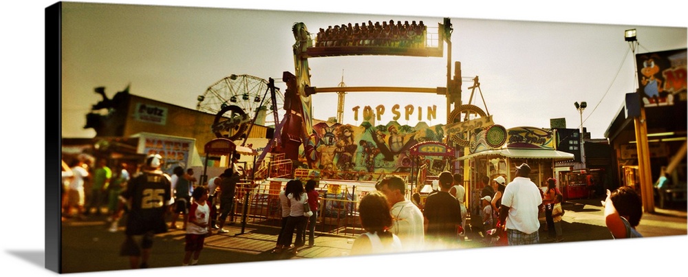 Tourists enjoying at an amusement park, Coney Island, Brooklyn, New York City, New York State,