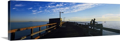 Tourists fishing on a pier, Goleta Beach Pier, Goleta, California