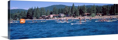 Tourists paddle boarding in Lake Tahoe, California