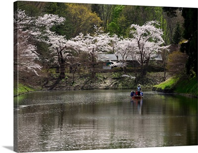Tourists rowing a boat in moat, Hirosaki Park, Hirosaki, Aomori Prefecture, Japan