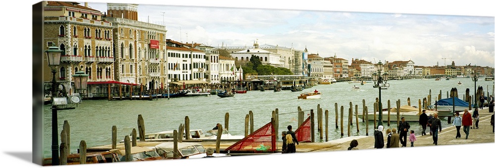 Tourists walking along a canal, Grand Canal, Fondamenta Della Dogana Alla Salute, Dorsoduro, Venice, Veneto, Italy