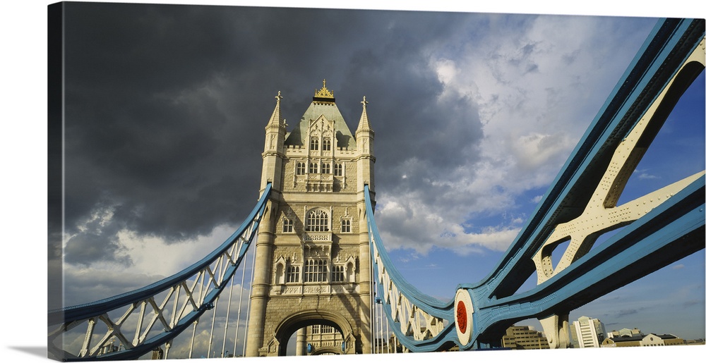 Low-angle panorama of the suspension and bascule bridge, the Tower Bridge, in London, England.