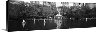Toy boats floating on water, Central Park, Manhattan, New York City