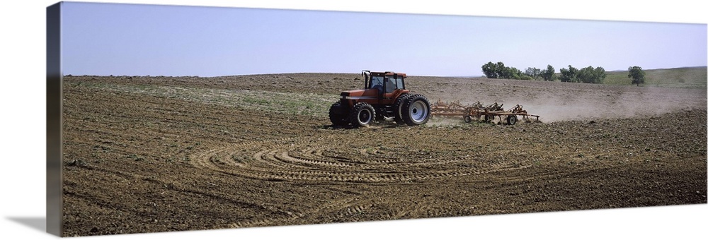 Tractor ploughing field, Kansas