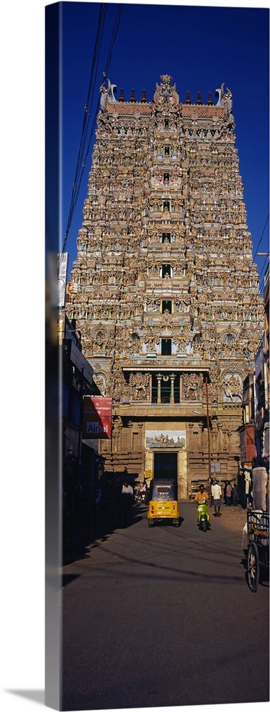 Traffic in front of a temple, Sri Meenakshi Hindu Temple, Madurai, Tamil Nadu, India