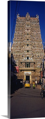 Traffic in front of a temple, Sri Meenakshi Hindu Temple, Madurai, Tamil Nadu, India