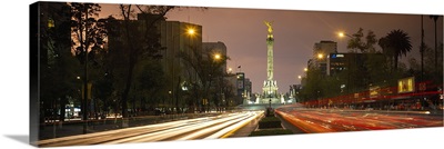 Traffic on road with victory column at night, Independence Monument, Paseso Del La Reforma, Mexico City, Mexico