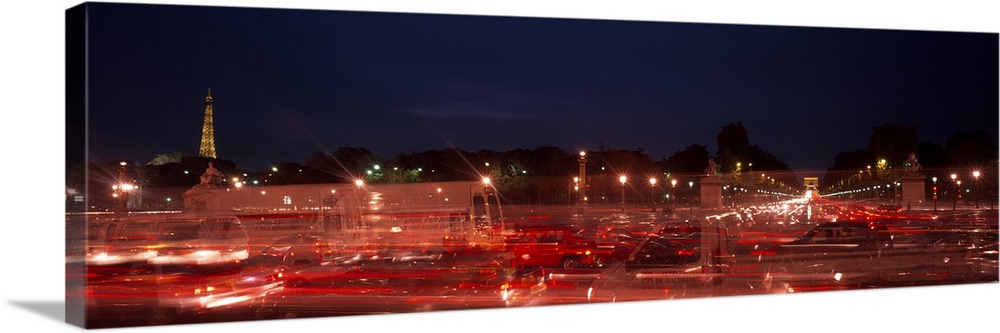 Traffic on the road at night with a prison in the background, Conciergerie, Paris, Ile-de-France, France