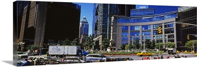 Traffic on the road in front of buildings, Columbus Circle, Manhattan, New York City, New York State