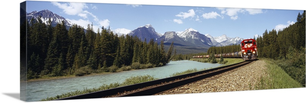 Train on a railroad track, Morants Curve, Banff National Park, Alberta, Canada