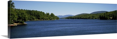Trees on both sides of a lake, Long Lake, Adirondack State Park, New York State