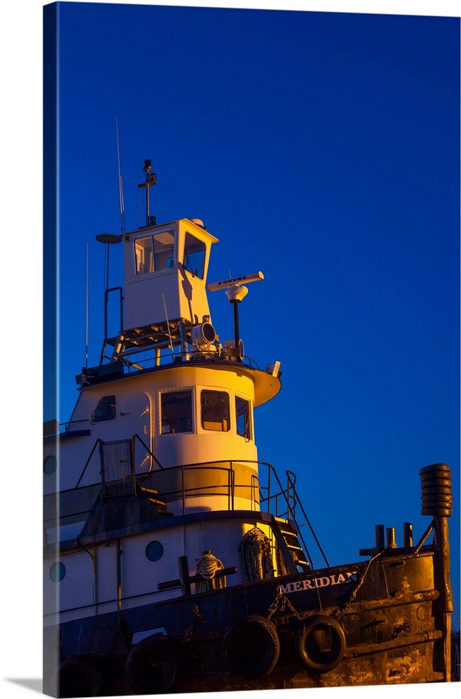 Tug boat at dawn, cape ann, gloucester, massachusetts, USA.