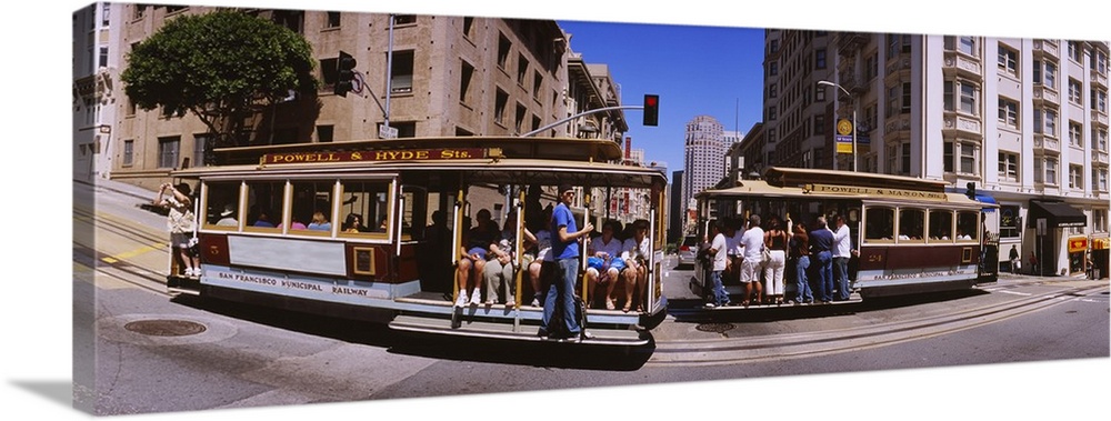 Two cable cars on a road, San Francisco, California