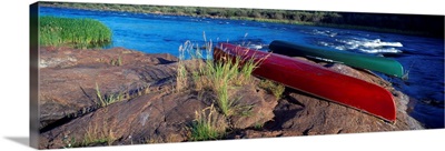 Two canoes on rock, Churchill River, Saskatchewan, Canada