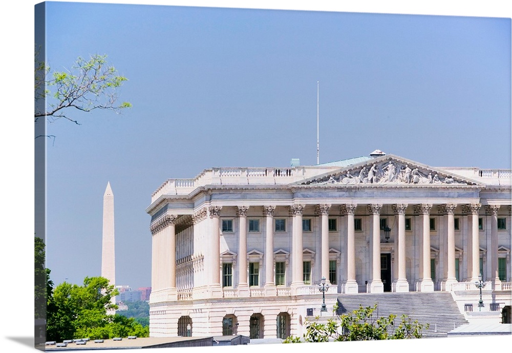 U.S. Senate side of U.S. Capitol with Washington Monument in background, Washington D.C..