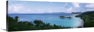 US Virgin Islands, St. John, Trunk Bay, Panoramic view of an island and a beach