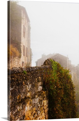 View of a town in fog, Cordes-sur-Ciel, Tarn, Midi-Pyrenees, France