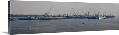 View of boats at commercial dock, Gulf of Thailand